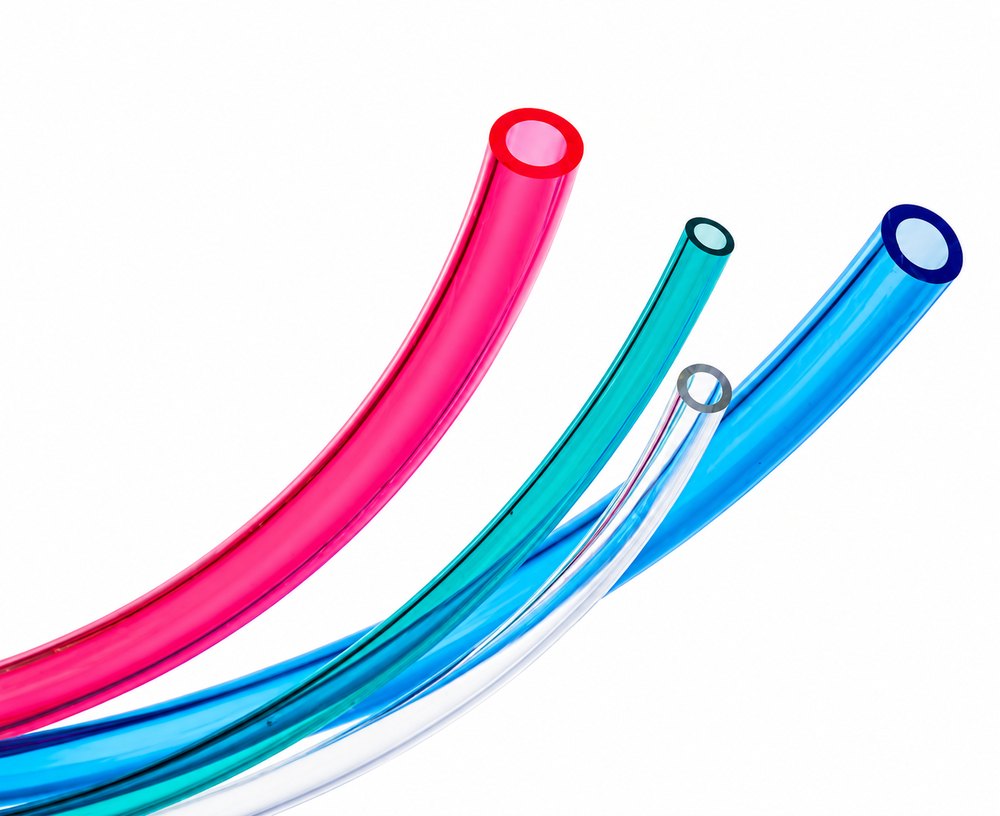 Translucent food-grade PU tube in pink, teal, blue and clear, showing the see-through wall